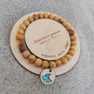 ocean wave beaded wristlet with abalone shell